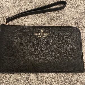 Kate Spade black leather wristlet.